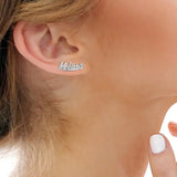 Curved Name Stud Earrings on a person